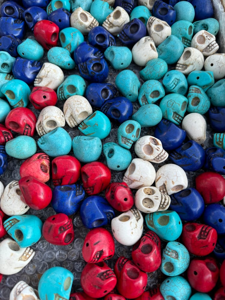 A mess of small, brightly colored cartoony skulls. 